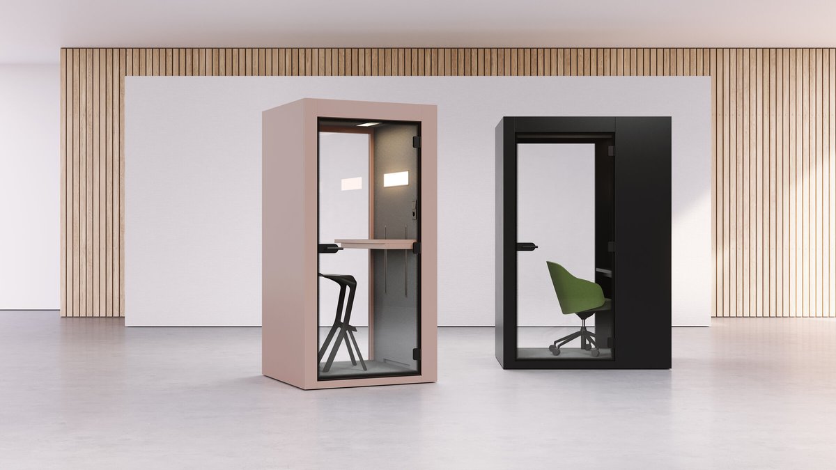Vetrospace XS telefonbokser i rosa og sort i et moderne kontorlandskap